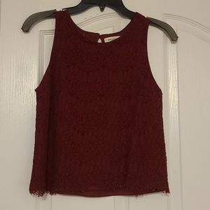 Maroon sleeveless shirt with lace overlay